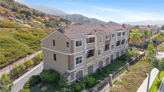 2802 Green River Rd Unit 101, Corona, CA 92882 - view from above of property with a mountain backdrop