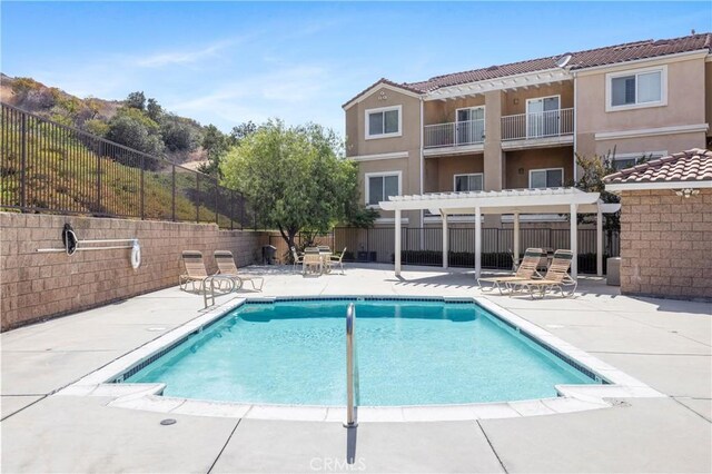 2802 Green River Rd Unit 101, Corona, CA 92882 - community pool featuring a pergola and a patio