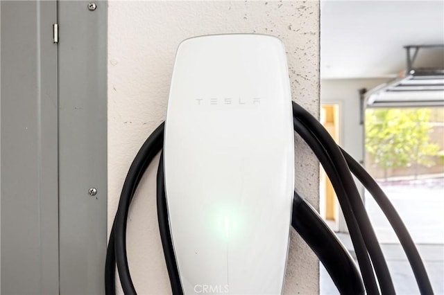2802 Green River Rd Unit 101, Corona, CA 92882 - garage view of electric vehicle charger