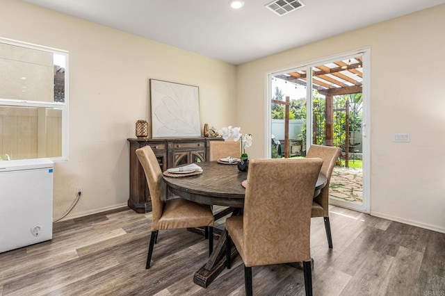 2910 Lucia Jade Loop, San Diego, CA 92139 - dining space featuring wood finished floors and recessed lighting