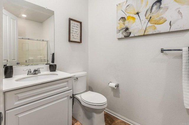 2910 Lucia Jade Loop, San Diego, CA 92139 - full bathroom featuring vanity, a shower with door, and wood finished floors