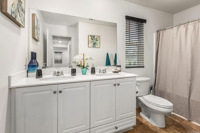 2910 Lucia Jade Loop, San Diego, CA 92139 - full bathroom with double vanity and shower / bath combination with curtain