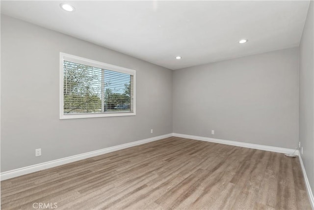 1837 N Studebaker Rd, Long Beach, CA 90815 - unfurnished room featuring recessed lighting and wood finished floors