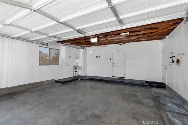 1837 N Studebaker Rd, Long Beach, CA 90815 - garage featuring a garage door opener