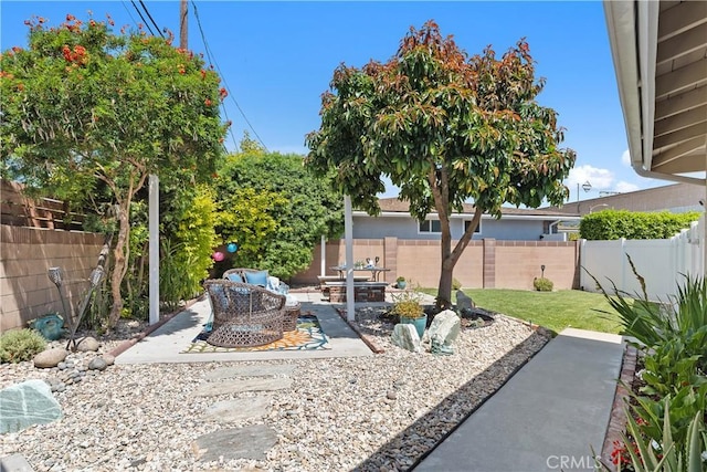 1837 N Studebaker Rd, Long Beach, CA 90815 - fenced backyard with a patio area