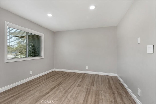 1837 N Studebaker Rd, Long Beach, CA 90815 - unfurnished room with wood finished floors and recessed lighting
