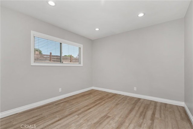 1837 N Studebaker Rd, Long Beach, CA 90815 - unfurnished room featuring wood finished floors and recessed lighting