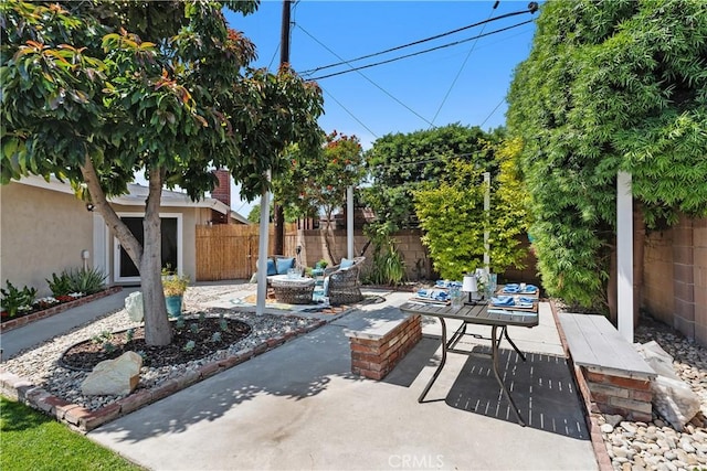 1837 N Studebaker Rd, Long Beach, CA 90815 - fenced backyard with a patio area