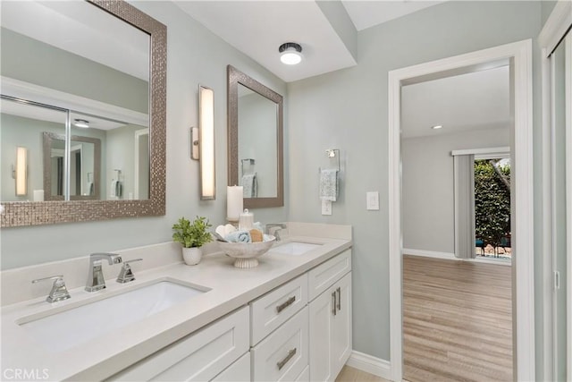 1837 N Studebaker Rd, Long Beach, CA 90815 - full bath with double vanity and wood finished floors