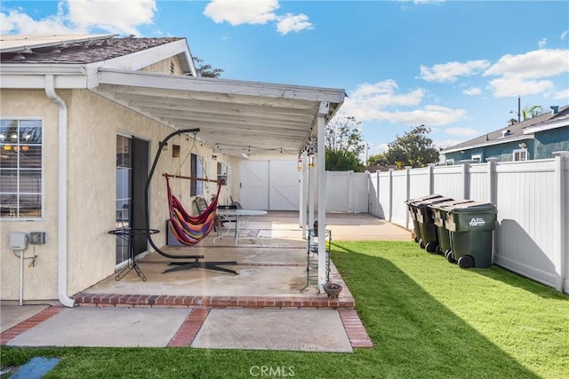 1320 Carob Way, Montebello, CA 90640 - fenced backyard featuring a patio