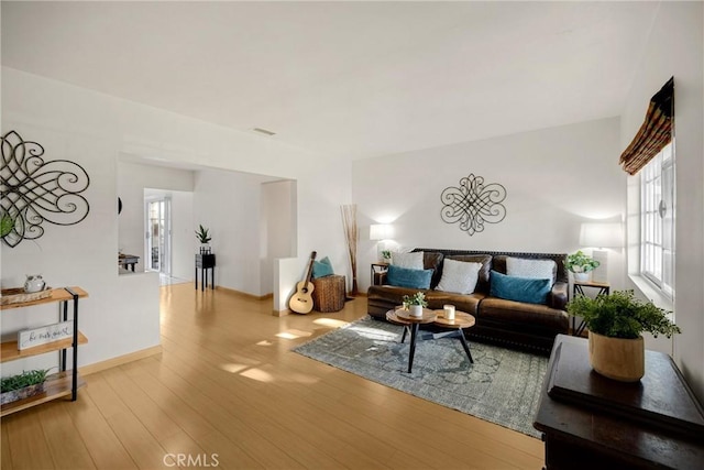 1320 Carob Way, Montebello, CA 90640 - living area with wood finished floors and baseboards