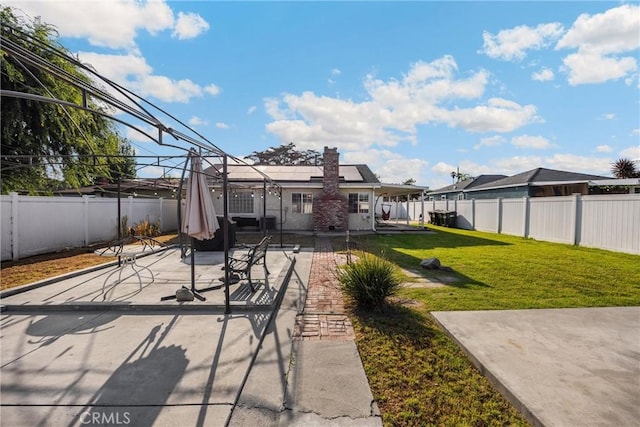 1320 Carob Way, Montebello, CA 90640 - fenced backyard featuring a patio area
