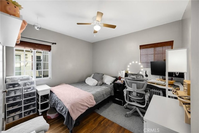 1320 Carob Way, Montebello, CA 90640 - bedroom featuring wood finished floors, a desk, and a ceiling fan