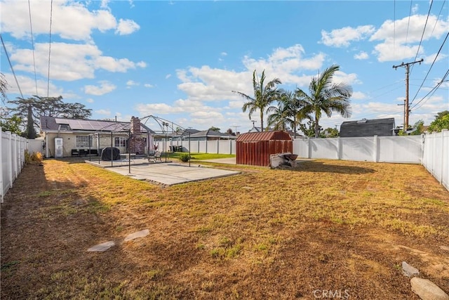 1320 Carob Way, Montebello, CA 90640 - fenced backyard featuring a shed and a patio