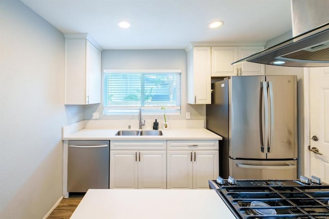 2133 Manchester Ave, Escondido, CA 92027 - kitchen featuring stainless steel appliances, extractor fan, white cabinetry, light countertops, and recessed lighting