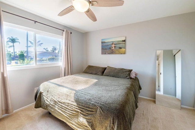 2133 Manchester Ave, Escondido, CA 92027 - bedroom with light colored carpet and a ceiling fan