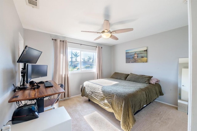 2133 Manchester Ave, Escondido, CA 92027 - bedroom featuring light carpet, an office area, and a ceiling fan