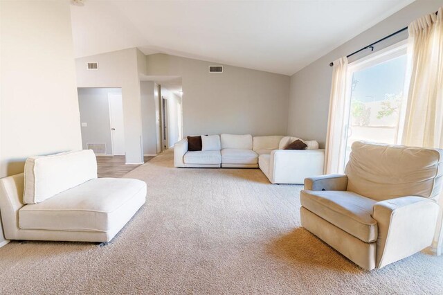 2133 Manchester Ave, Escondido, CA 92027 - carpeted living room featuring lofted ceiling