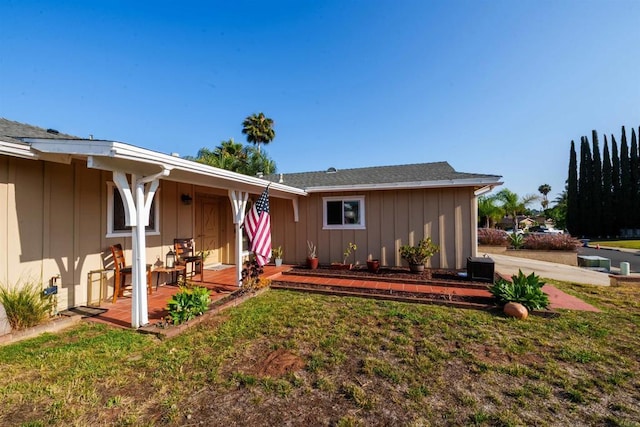 2133 Manchester Ave, Escondido, CA 92027 - view of front of property with board and batten siding and a front yard