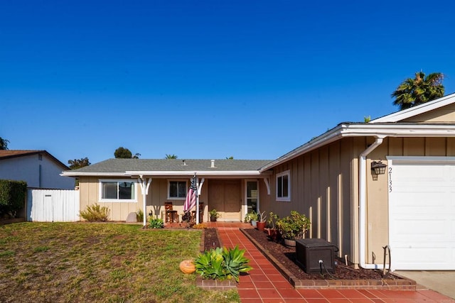 2133 Manchester Ave, Escondido, CA 92027 - ranch-style home with an attached garage and board and batten siding