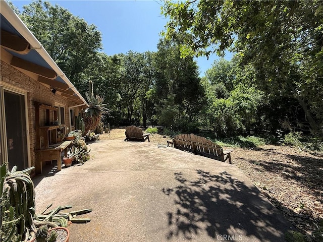 11955 Santa Lucia Rd, Atascadero, CA 93422 - view of patio / terrace with view of wooded area