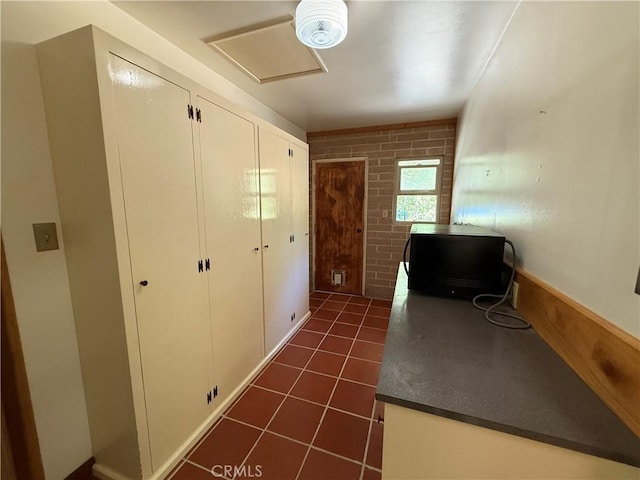 11955 Santa Lucia Rd, Atascadero, CA 93422 - corridor with dark tile patterned floors