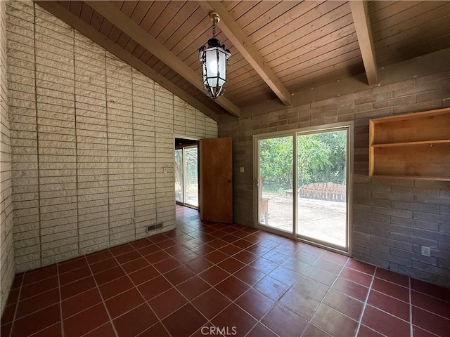 11955 Santa Lucia Rd, Atascadero, CA 93422 - spare room with dark tile patterned floors, a wood ceiling with exposed beams, and high vaulted ceiling