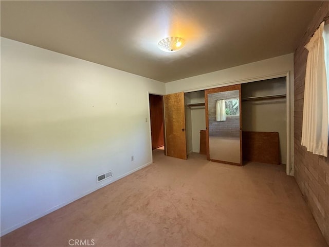 11955 Santa Lucia Rd, Atascadero, CA 93422 - unfurnished bedroom with a closet and light colored carpet