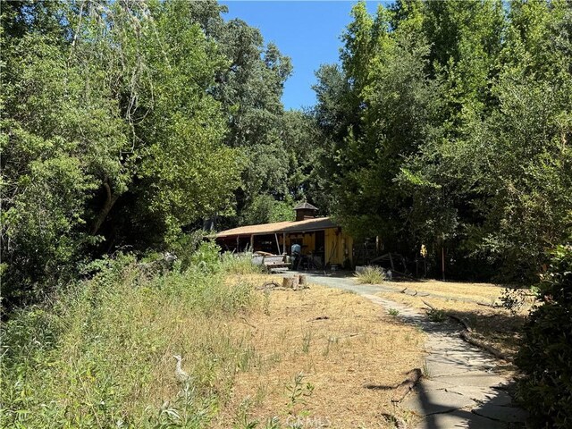 11955 Santa Lucia Rd, Atascadero, CA 93422 - back of house with a wooded view
