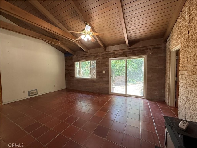 11955 Santa Lucia Rd, Atascadero, CA 93422 - empty room with wood ceiling, brick wall, dark tile patterned floors, and ceiling fan