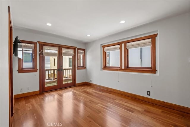 401 8th St, Manhattan Beach, CA 90266 - unfurnished room featuring french doors, wood finished floors, and recessed lighting