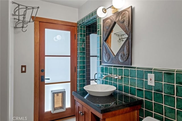 401 8th St, Manhattan Beach, CA 90266 - bathroom with vanity and tile walls