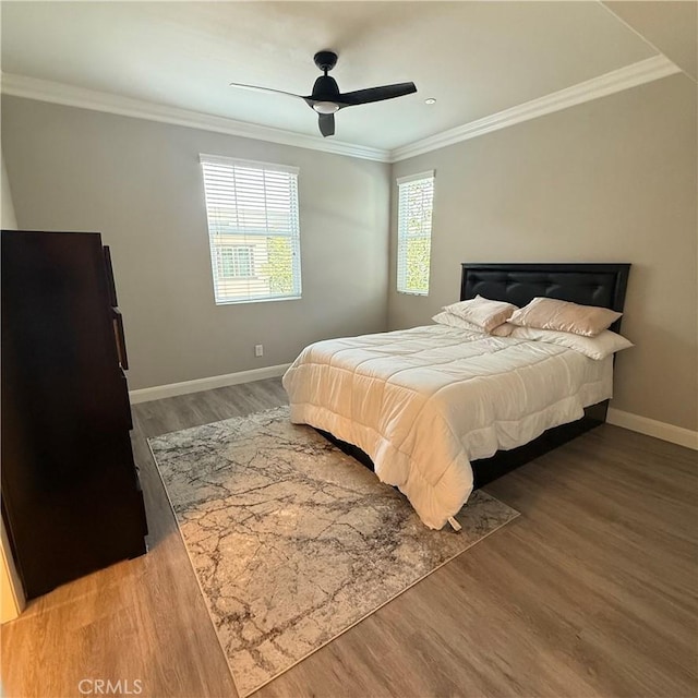 7449 Solstice Pl, Rancho Cucamonga, CA 91739 - bedroom featuring wood finished floors, ornamental molding, and ceiling fan