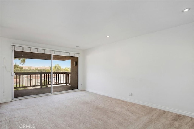 23372 Caminito Marcial Unit 187, Laguna Hills, CA 92653 - empty room with carpet floors and recessed lighting