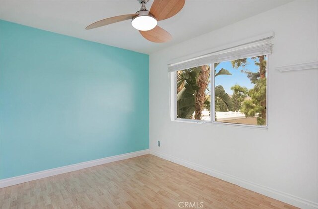 23372 Caminito Marcial Unit 187, Laguna Hills, CA 92653 - unfurnished room featuring wood finished floors and a ceiling fan