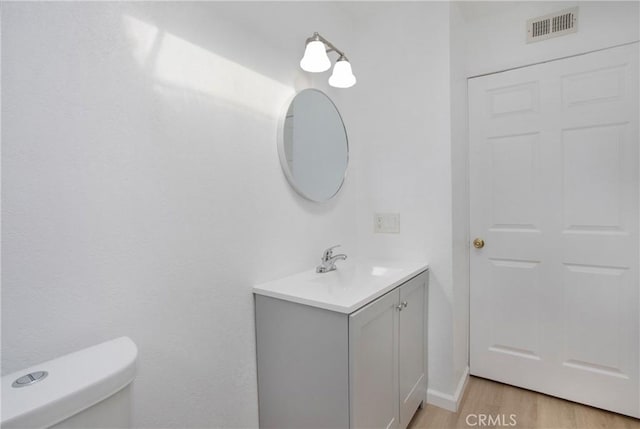 23372 Caminito Marcial Unit 187, Laguna Hills, CA 92653 - bathroom featuring vanity and wood finished floors