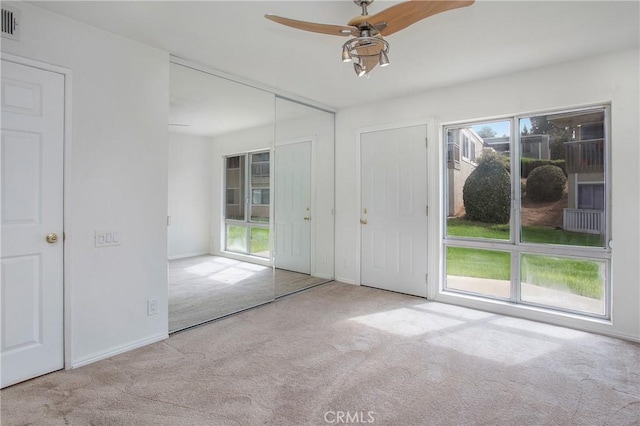 23372 Caminito Marcial Unit 187, Laguna Hills, CA 92653 - unfurnished bedroom featuring carpet floors and ceiling fan