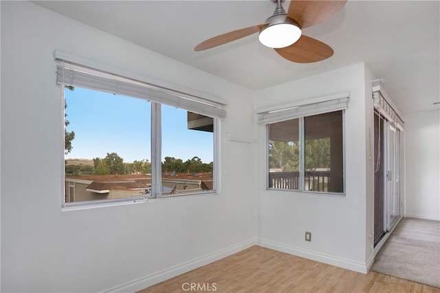 23372 Caminito Marcial Unit 187, Laguna Hills, CA 92653 - spare room with wood finished floors and a ceiling fan
