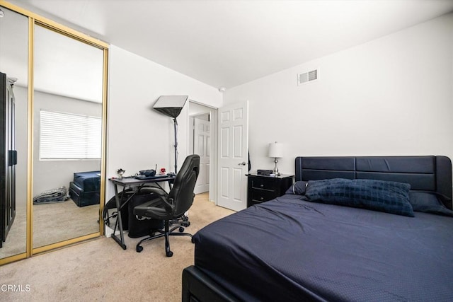 1222 Acadia Pl, Ventura, CA 93003 - bedroom with light colored carpet, a closet, and a desk