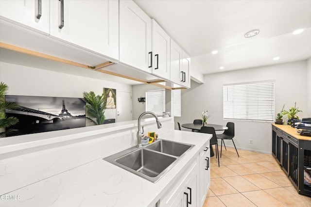 1222 Acadia Pl, Ventura, CA 93003 - kitchen featuring white cabinets, light countertops, recessed lighting, and light tile patterned flooring