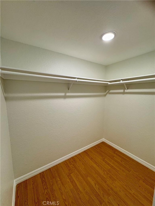 9010 Burke St Unit 22, Pico Rivera, CA 90660 - spacious closet with wood finished floors