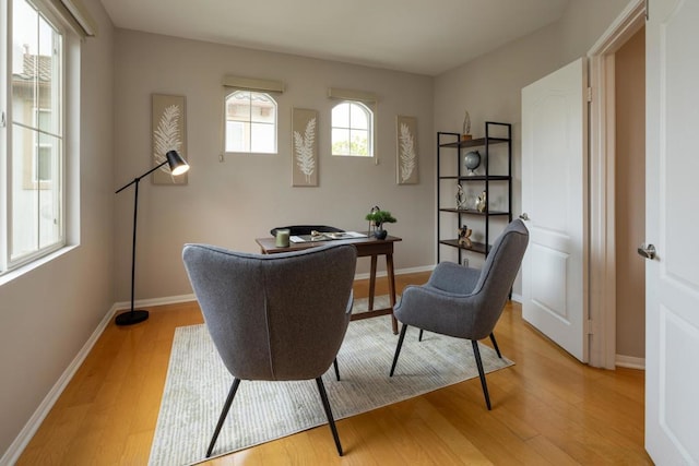 12625 Fiorenza Ln Unit 236, San Diego, CA 92128 - office area featuring light wood-style flooring and baseboards