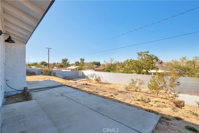 61638 La Jolla Dr, Joshua Tree, CA 92252 - fenced backyard featuring a patio