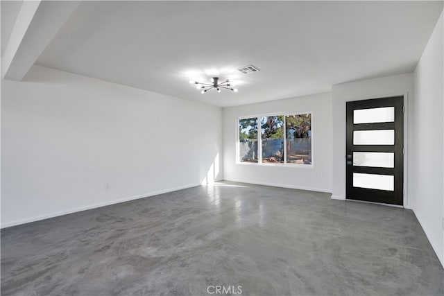 61638 La Jolla Dr, Joshua Tree, CA 92252 - entrance foyer with concrete floors and a chandelier