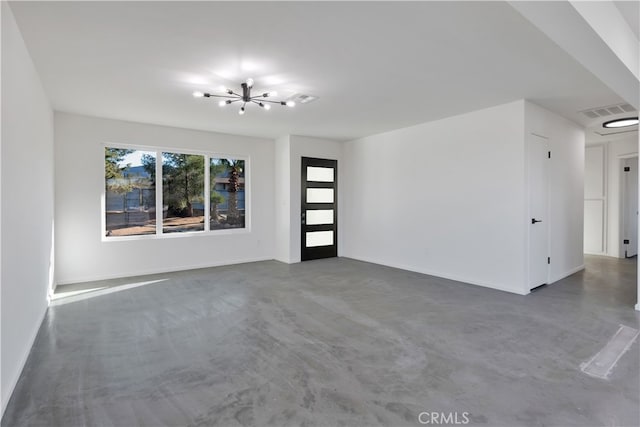 61638 La Jolla Dr, Joshua Tree, CA 92252 - unfurnished living room with concrete flooring and a chandelier
