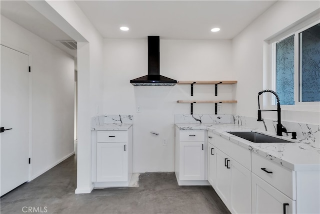 61638 La Jolla Dr, Joshua Tree, CA 92252 - kitchen featuring wall chimney exhaust hood, concrete floors, light stone countertops, open shelves, and recessed lighting