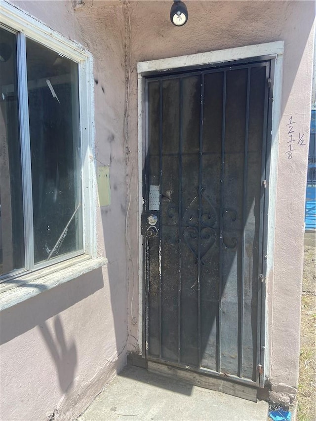 12116 S Willowbrook Ave, Compton, CA 90222 - property entrance with stucco siding