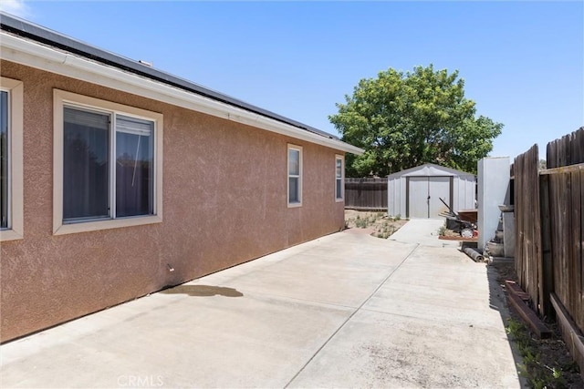 2306 Apion Ct, Paso Robles, CA 93446 - fenced backyard with a patio area and a storage unit