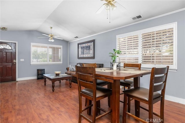 2306 Apion Ct, Paso Robles, CA 93446 - dining space with ceiling fan, wood finished floors, vaulted ceiling, and crown molding