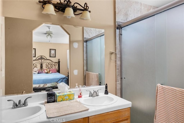 2306 Apion Ct, Paso Robles, CA 93446 - ensuite bathroom with double vanity, a stall shower, and a ceiling fan